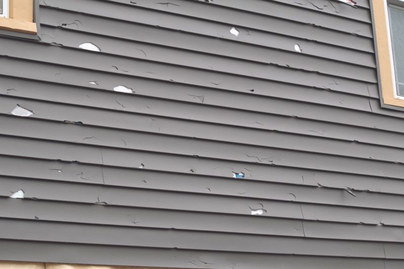 Removing Damaged Siding Panels